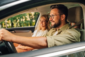 couple driving in car